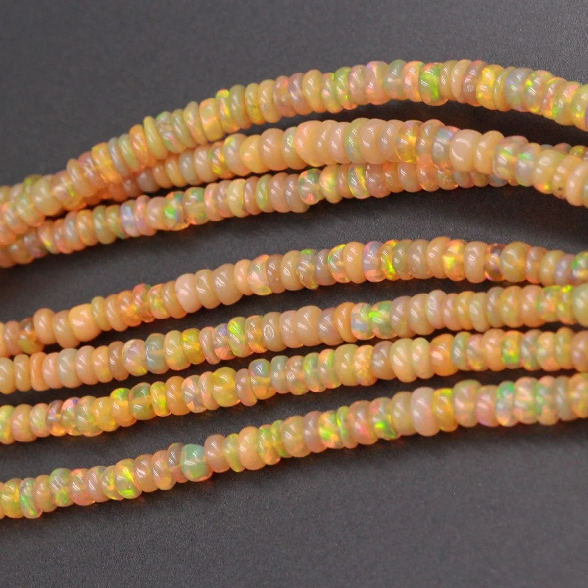 16 Inches Ethiopian Opal Beads Rondelle Graduating 3mm 4mm AAA Super Flashy Fiery Rainbow Yellow Opal Smooth Rondelle Beads 16" Strand A7