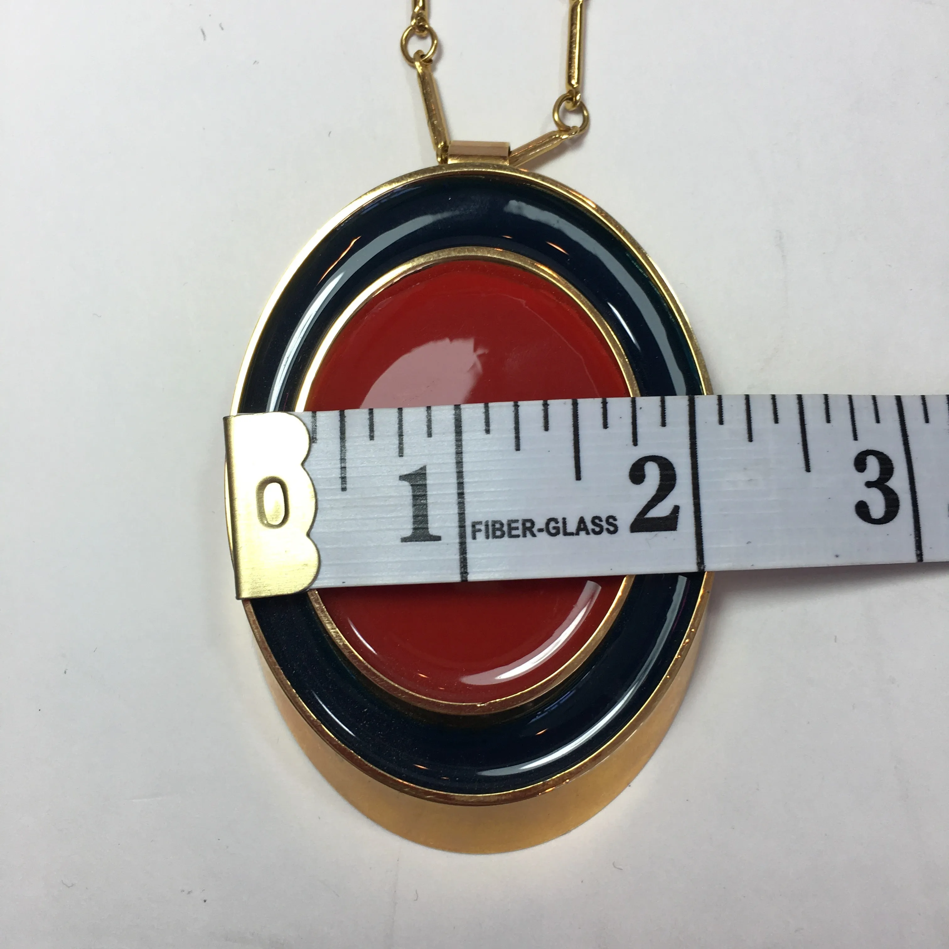 Guy Laroche Gold Tone Necklace with Red   Navy Enamel Plated Oval Pendant