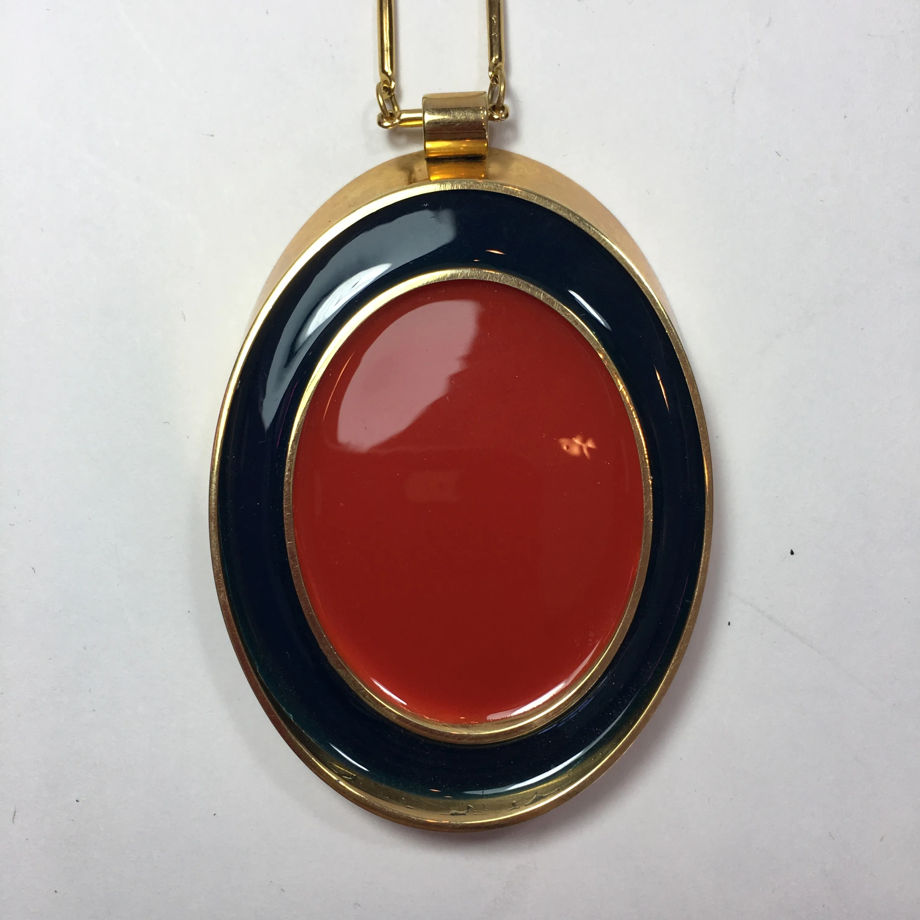 Guy Laroche Gold Tone Necklace with Red   Navy Enamel Plated Oval Pendant