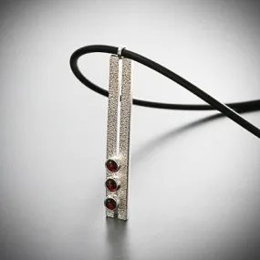 Linear silver pendant