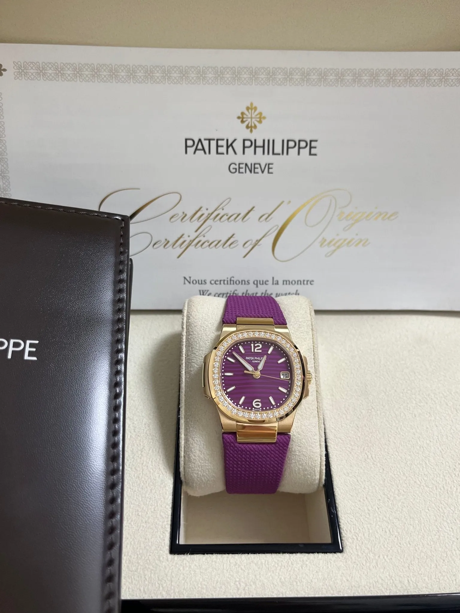 Patek Philippe Nautilus 32mm Diamond Bezel Rose Gold Purple Wave Dial 7010R-013