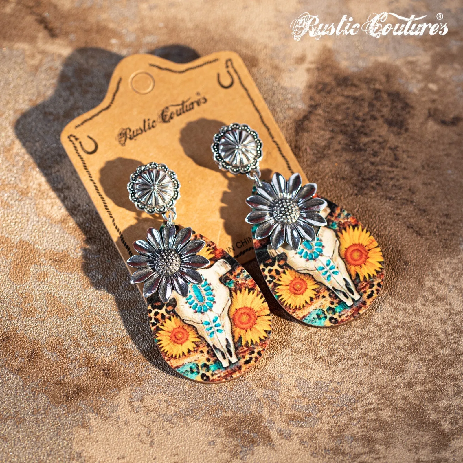 Rustic Couture's Metal Sunflower Wood Painted Bull Skull Dangling Earring